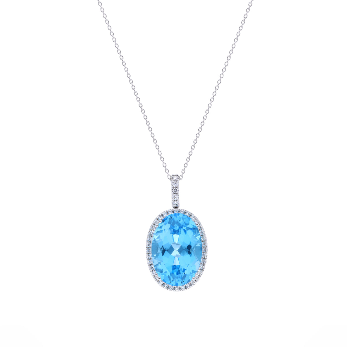 18k Pendant And Chain With Blue Topaz